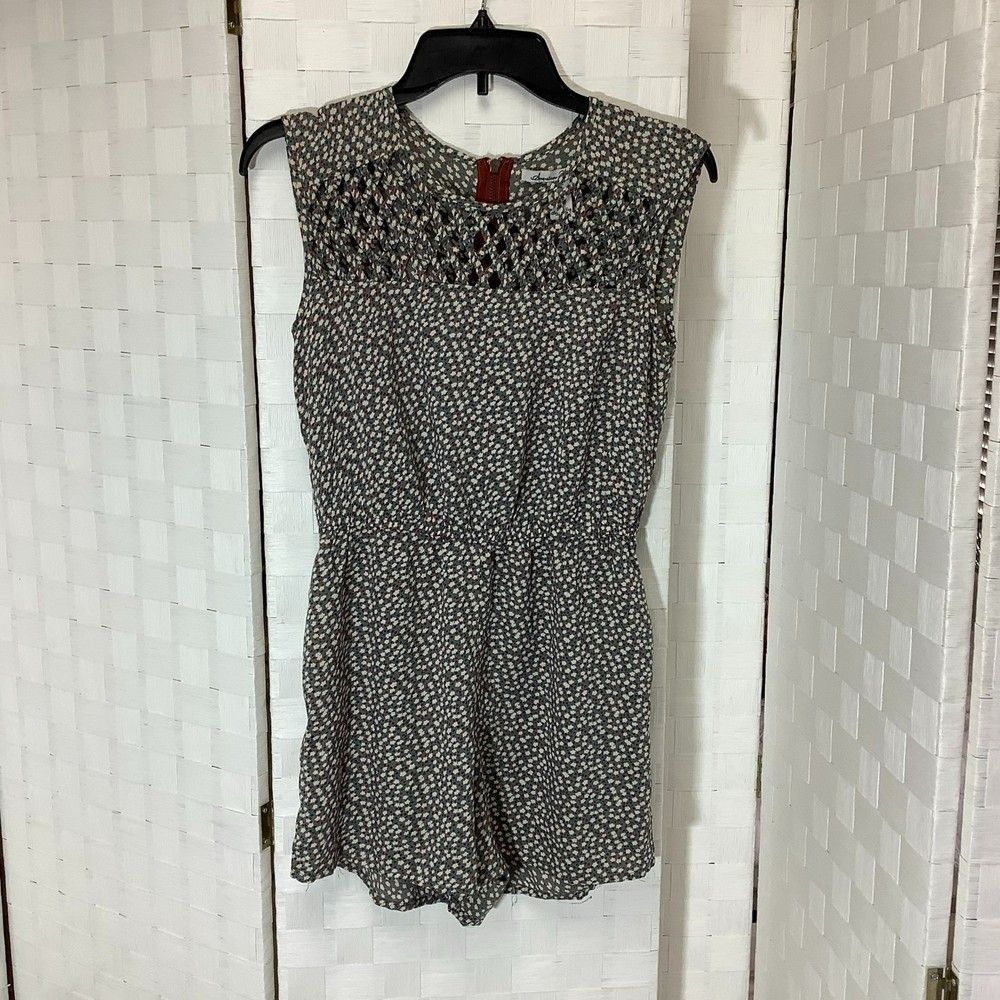 american rag floral romper with cutouts size small